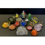 A collection of nineteen glass paperweights inc Gleneagles crystal, etc assorted colours, patterns