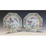 A pair of Chinese octagonal dishes, painted in polychrome enamels with phoenix, chrysanthemums,
