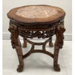 A Chinese hardwood fish bowl stand or table, shaped circular top with inset soapstone panel, above a