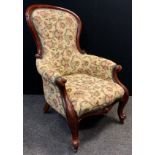 A Victorian mahogany balloon-back armchair, upholstered back, arms, and sprung seat, scroll arms,
