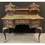 A Louis XIV revival / Rococo style walnut writing desk, carved cresting, quarter galleried back with