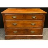 An Edwardian walnut chest of drawers, two short, over two long drawers, 77.5cm high x 106.5cm wide x