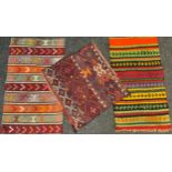 Rugs and carpets - a Turkish Kilim rug, hand-knotted in bands of varying width in bright tones of
