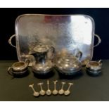 A rounded rectangled silver plated twin handled tray; four piece tea set etc