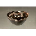 A miniature Blue John bowl, strong chevron marks and colour tones, 4cm diameter, 2.3cm high