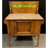 An Arts and Crafts style oak wash-stand, tiled oak splash back, Rosa Grey marble top, single small