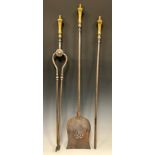 A set of three George III steel and brass fire irons, comprising tongs, poker and shovel, knop
