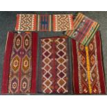 A Turkish Kilim Nomad sack / rug, hand-knotted, with central geometric band, in tones of deep