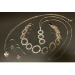 A 925 silver mounted Cz ring link bracelet and pendant , stamped 925 cz; pair of earrings etc 31.
