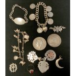 A Victorian 1887 crown, 3 silver fobs silver charm, bracelet etc