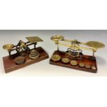 Two sets of late 19th/early 20th century postal letter scales, both with graduated brass weights,