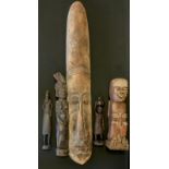 Tribal Art - a narrow elongated wall mask, 97cm long, carved figure of a laughing man, others elders