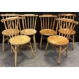 A matched set of six 19th century pine spindle-back chairs, 83cm high x 48cm wide.