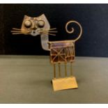 A 1970s Jarc French Brutalist metal sculpture, Cat with curly tail, 18.5cm high