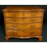 A George III mahogany serpentine bachelor’s chest, fiddleback top above a slide and four long