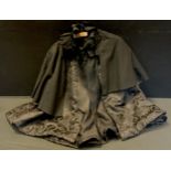 A Victorian black shoulder capelet, all over floral scrolling pattern, beaded detailed collar,