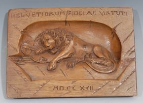 A 19th century Grand Tour panel, carved after Bertel Thorvaldsen with the Lion of Lucerne, 14.5cm