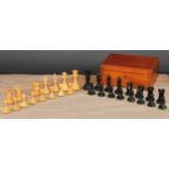 A boxwood and ebonised Staunton chess set, marked for King’s side, the Kings 7cm high, mahogany box