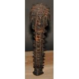Tribal Art - a carved figural staff or votive, 26cm long