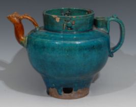 A Chinese high fired stoneware wine pot, the rim pierced with Indian Svastika, double-walled with