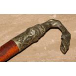 A 19th century novelty riding crop, of equestrian interest, the silver plated handle cast as a