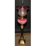 A Victorian brass and vaseline glass Corinthian column table oil lamp, adjustable burner, etched