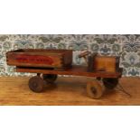 Juvenalia & Memories of Childhood - a stained pine motor tipping wagon, constructed in the 'Folk