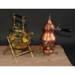 An Arts & Crafts brass spirit kettle, ebony handle and finial, William Soutter & Sons, 34cm high; an