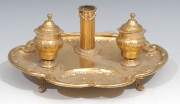 A Continental gilt copper shell shaped inkstand, scroll feet, 26cm wide, 19th century