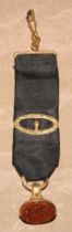 A 19th century gilt metal fob seal, goldstone matrix, 2cm wide, c.1870