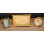 An Art Nouveau turquoise mounted gilt metal easel photograph frame, 9cm high, c.1905; others (3)