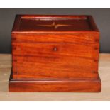 An early 20th century mahogany and parquetry sailor’s ditty box, hinged cover inlaid with a star,