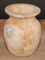 An Egyptian alabaster ovoid vessel, 13cm high