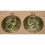 A pair of Grand Tour portrait plaques, cast in relief with profile relief busts of Claudius and