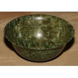 A Chinese spinach jade circular bowl, 132cm diam