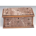 A 19th century marble table casket, the mahogany carcass applied overall with veined panels,