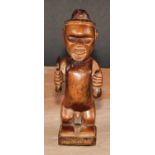 Tribal Art - a Bembe Biteki figure, he stands, holding a knife and a gourd, 16cm high