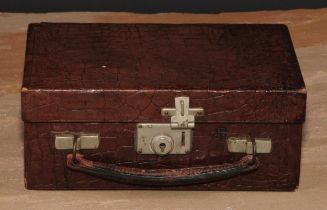 A mid-20th century crocodile leather travelling jewellery box, hinged cover enclosing a fitted tray,