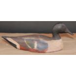 A painted softwood decoy duck, 37cm long