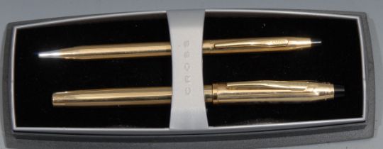 A Cross 18ct gold plated fountain pen and ball point pen set, the fountain pen with 18ct gold nib,