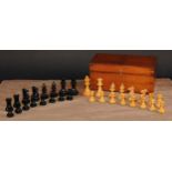 A boxwood and ebonised Staunton pattern chess set, weighted bases, the Kings 7cm high, walnut box