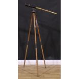 An early 20th century brass three-draw telescope, inscribed Reconditioned for John Barker & Co