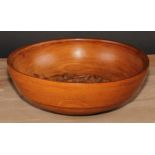A turned bowl, possibly by one of the Yorkshire Critters, the centre carved with a Yorkshire rose,