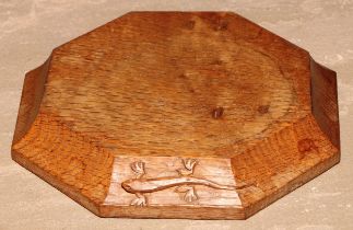 Martin Dutton, Lizardman of Huby, Yorkshire - an oak octagonal teapot stand, adzed overall, carved