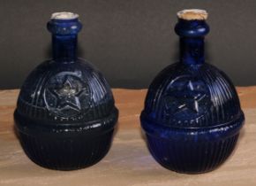 A Victorian blue glass Star Hardens Hand Grenade Fire Extinguisher, 17cm high; another (2)