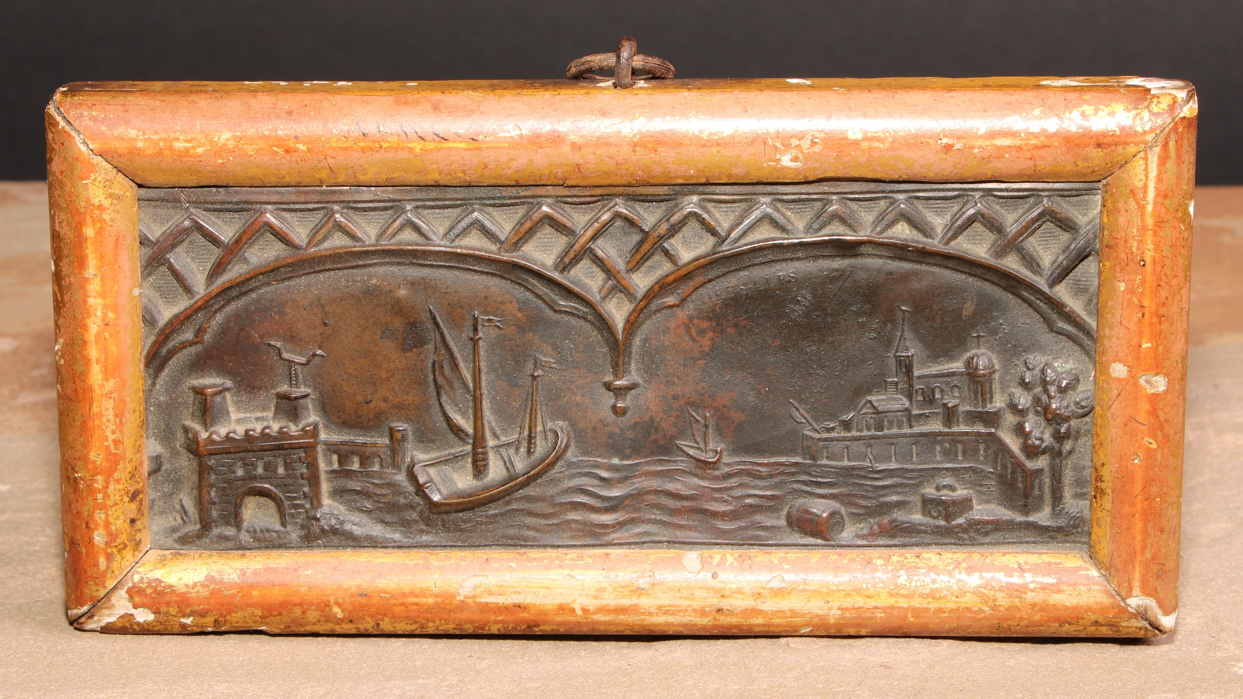 A 19th century bas relief, depicting a Continental harbour scene, gilt frame, 8.5cm x 16.5cm overall