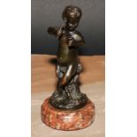 After Clodion (19th century), a dark patinated bronze, of a young satyr, signed in the maquette,