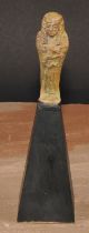 Antiquities - an Ancient Egyptian faience shabti, 9cm long, collector's display stand