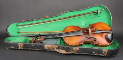 A violin, the one-piece back 36.5cm long excluding button, outlined throughout with purfling, 59.5cm