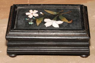 An Italian pietra dura and ebonised casket, hinged cover set with a panel inlaid with a spray of
